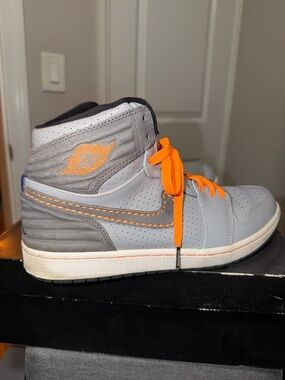 Nike Air Jordan 1 “93” Grey and Orange High-Top Sneaker